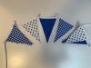 Vlaggenlijn punt ster, boerenbont en stip blauw