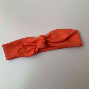 Knoophaarband met strik uni oranje