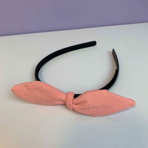 Losse strik uni zalm roze