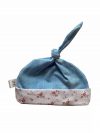 Nicu mutsje met knoop uni jeans bloemetjes